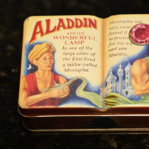 Small Book Aladdin Tin The Silver Crane Company 1995 - Picture 1 of 4